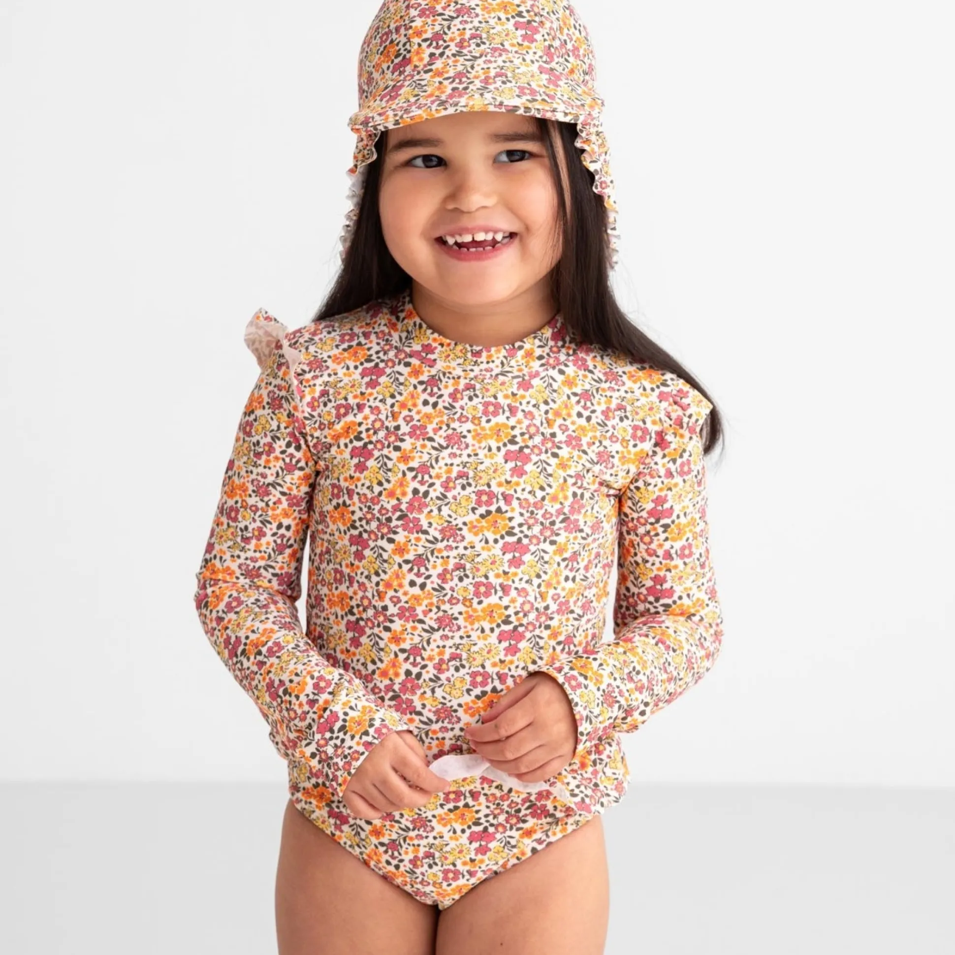 Prénatal UV zwempak bloemen lange mouwen all over print multi